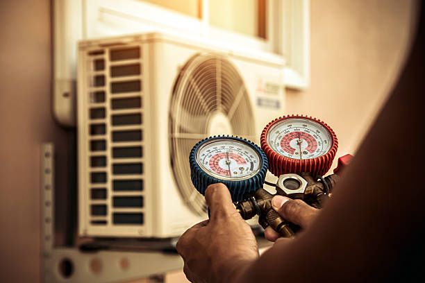 Professional Air Conditioning Service technician working in Slate Hill, NY